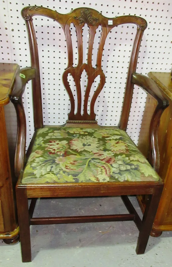 A George III mahogany carver chair, with splat back on square block supports.  E9