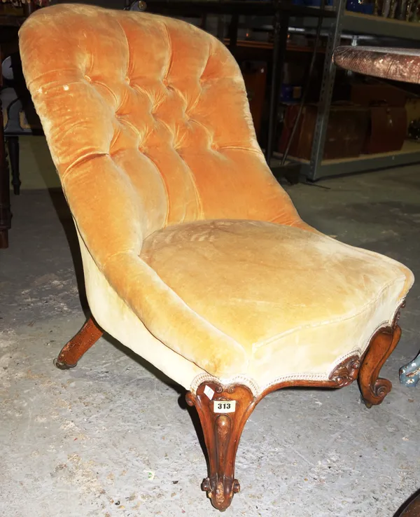A Victorian walnut framed button back upholstered nursing chair on carved cabriole supports., (a.f)  H4