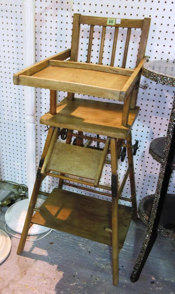 An early 20th century pine metamorphic child's high chair cum play chair 100cm high.  A6