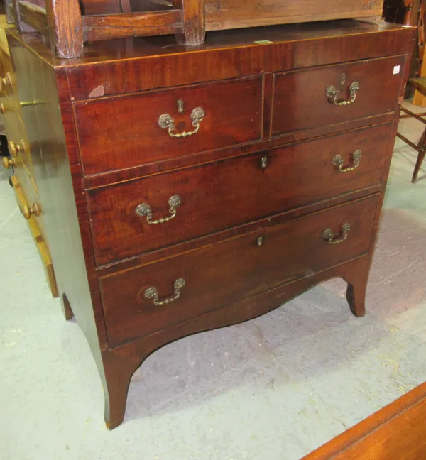 An early 19th century mahogany chest of two short and two long drawers, on bracket feet, 101cm wide.  D8