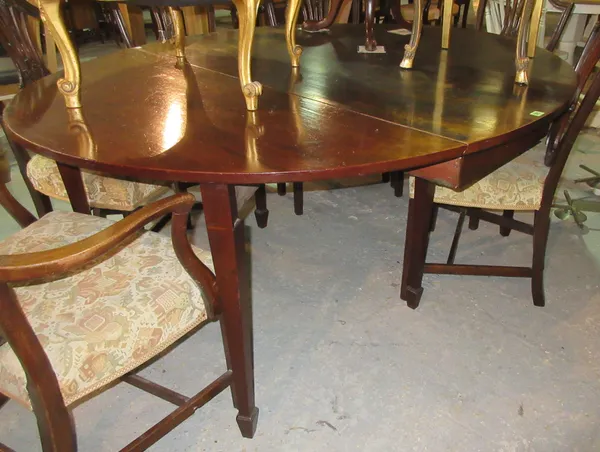 A late George III mahogany circular drop flap gateleg table, on tapering square supports, 178cm wide x 72cm high.  D6