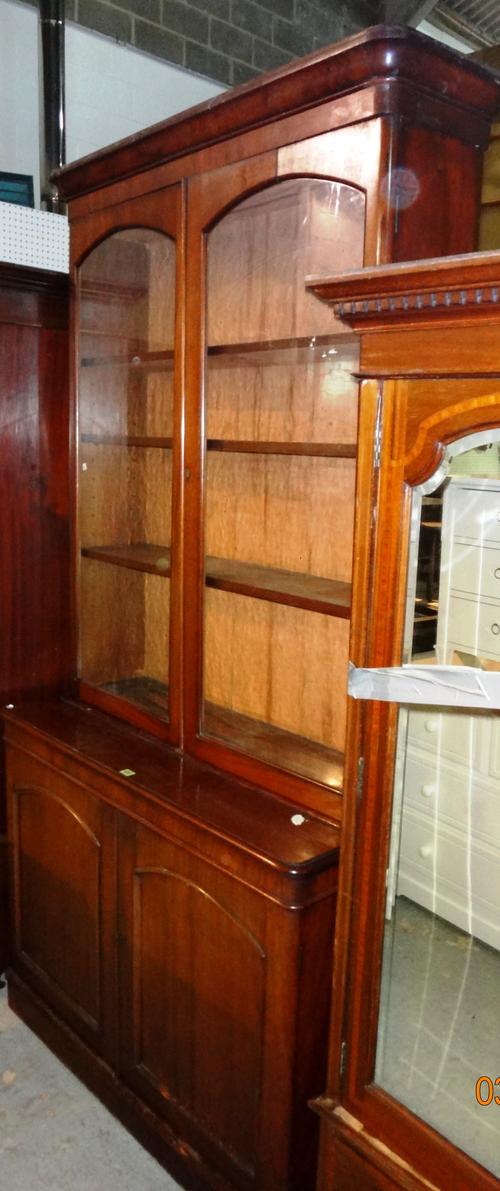 A Victorian mahogany library bookcase, twin glazed door top, 122cm wide x 200cm high.  M8