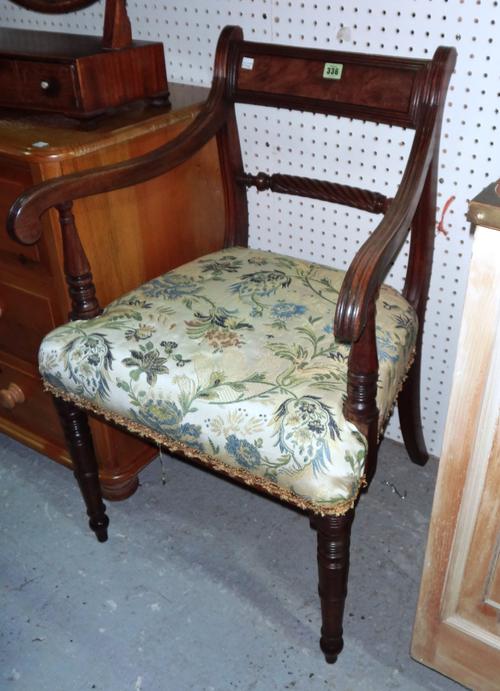 A Regency mahogany open armchair on ring turned tapering supports, and a 19th century mahogany pot cupboard on square block supports, 56cm wide x 80cm