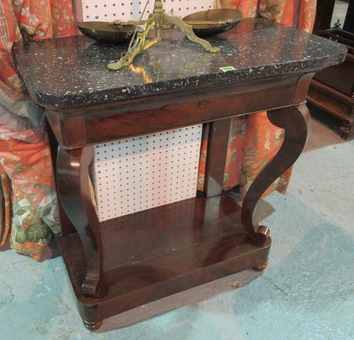 An early 19th century French mahogany console table, with black marble top on scroll supports (a.f), 79cm wide x 82cm high.  D6
