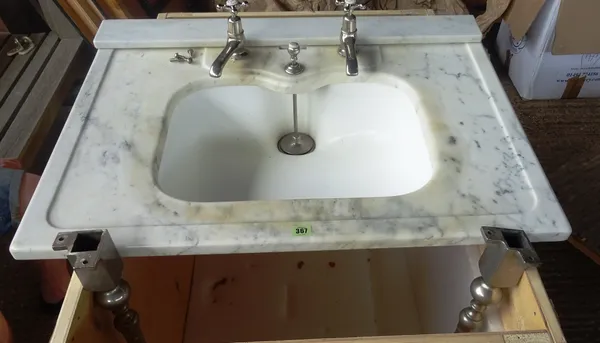 A 20th century white porcelain sink with white marble surround, on metal supports, 88cm wide x 100cm high.  OUT