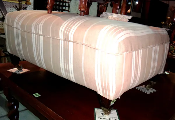 An early 20th century mahogany framed upholstered footstool, 73cm wide.  G8