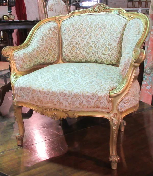 A Louis XV style gilt framed floral upholstered fauteuil, 76.5cms wide.  D6