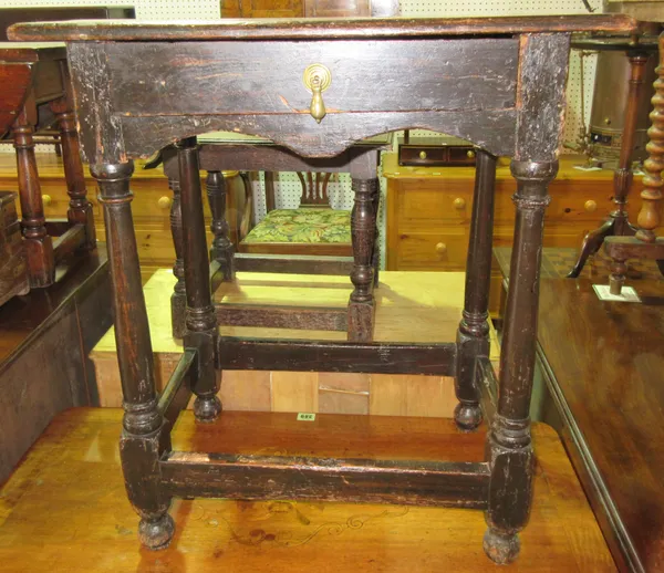 A 19th century oak rectangular single drawer side table, 61cm wide and an oak joint stool, (2).  E8