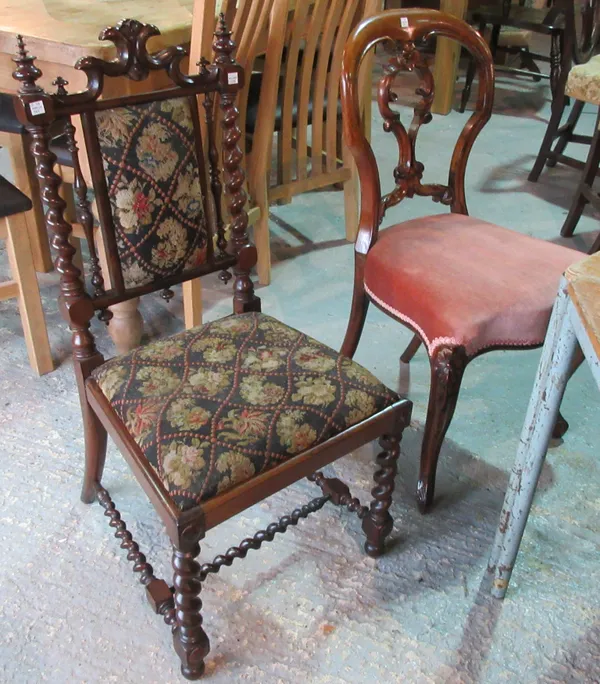 A set of three Victorian rosewood balloon back dining chairs, and a rosewood framed hall chair with barleytwist supports, (4).   B6