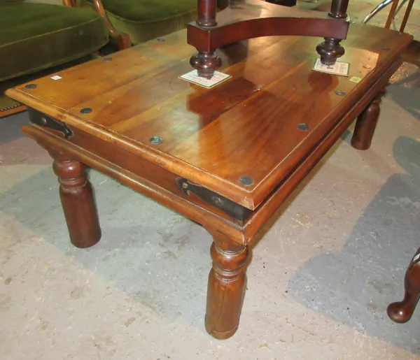 A 20th century hardwood studded coffee table, 110cm wide x 40cm high, and a square mahogany occasional table, 58cm wide x 70cm high, (2).  C6
