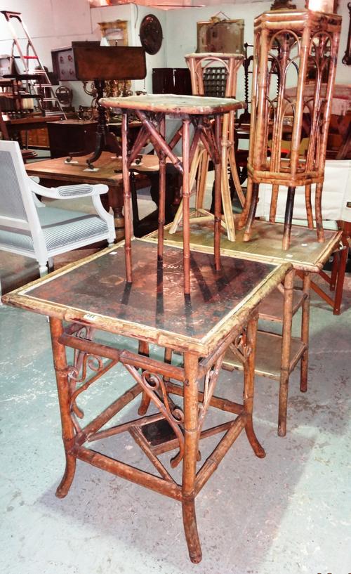 A group of early 20th century bamboo furniture, comprising; a chinoiserie decorated square occasional table, 60cm wide x 74cm high, three smaller occa