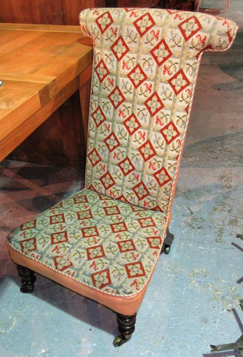 A Victorian rosewood framed prayer chair, a 19th century ash and beech bar back open armchair, and a Victorian mahogany adjustable piano stool, (3).