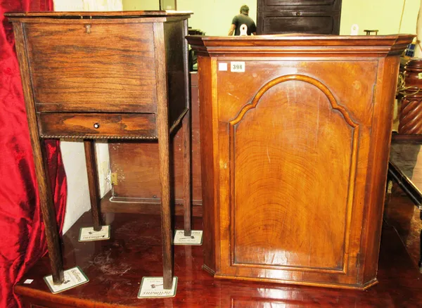 A Queen Anne style hanging corner cupboard, 50cm wide, together with a mid-20th century oak work table, 35cm wide, (2). G6
