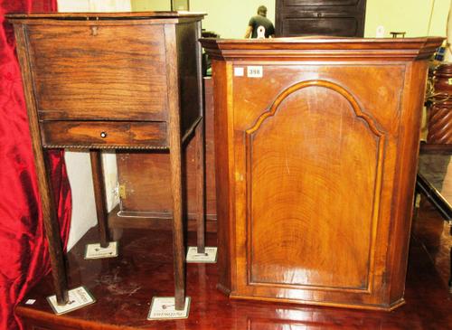 A Queen Anne style hanging corner cupboard, 50cm wide, together with a mid-20th century oak work table, 35cm wide, (2). G6