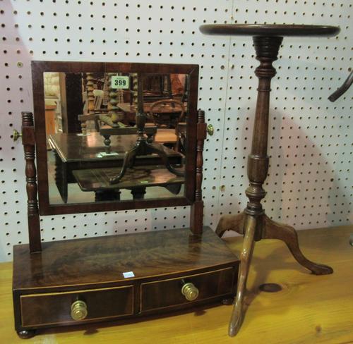 An early 19th century mahogany two drawer toilet mirror, 42cm wide, together with two reproduction wine tables, 26cm and 37cm diameter, (3).  F9