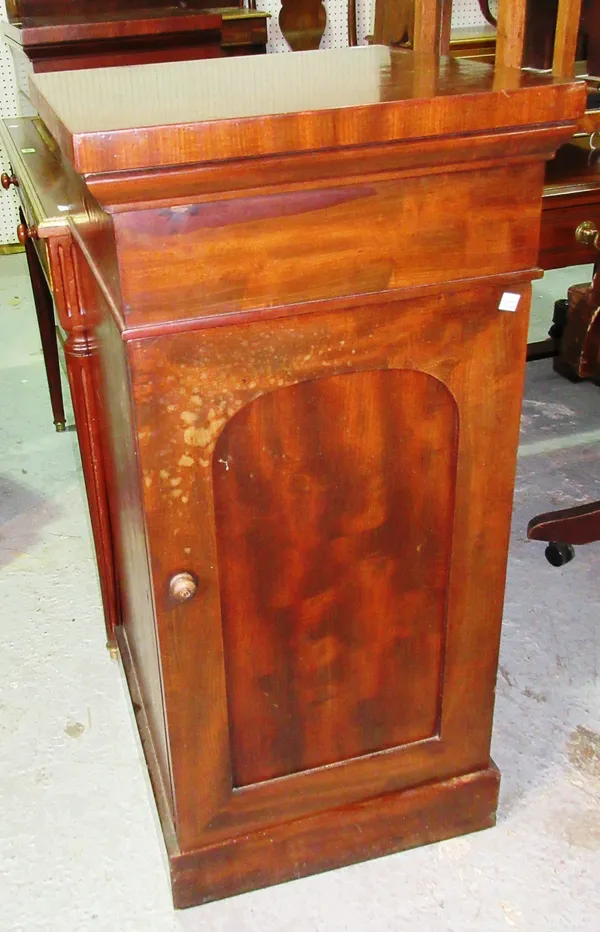 A pair of late 19th century mahogany pedestals, with cupboard base, 46cm wide x 94cm high (2).  B8