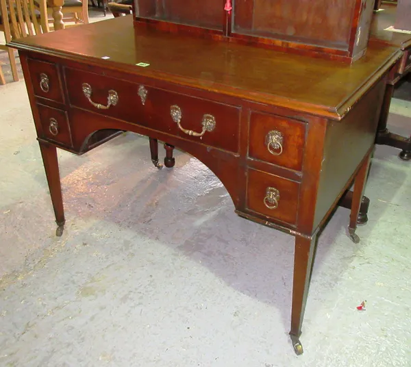 A George III mahogany dressing table, on square tapering supports, 106cm wide x 74cm high. D9