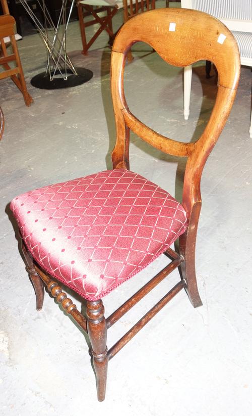 A set of four 19th century stained mixed wood balloon back chairs (4).  18