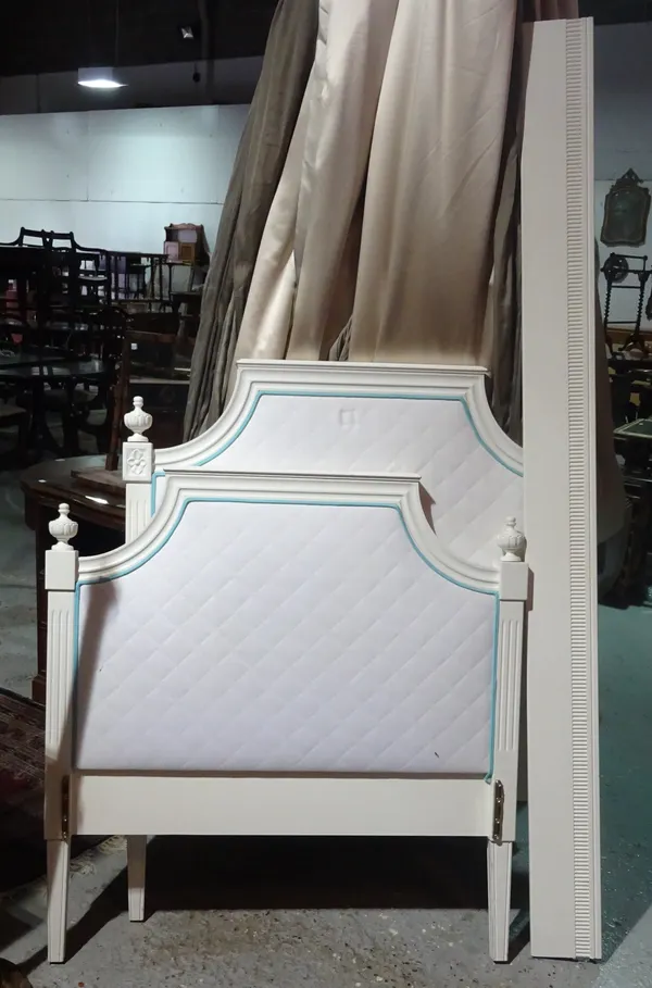 A pair of 20th century white painted single beds, each 101cm wide x 126cm high x 200cm long, (2).  BAY4