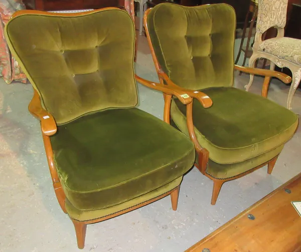 A pair of mid-20th century beech spoon bowl pierced open armchairs, with green upholstery, (2).  C6