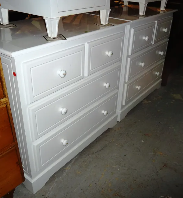 A pair of 20th century white lacquer chests of two short and two long drawers, 93cm wide x 86cm high, (2).  L8