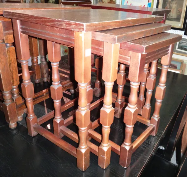 A oak nest of three graduated occasional tables, 49cm wide x 47cm high and two further nests of three, (9). BAY2