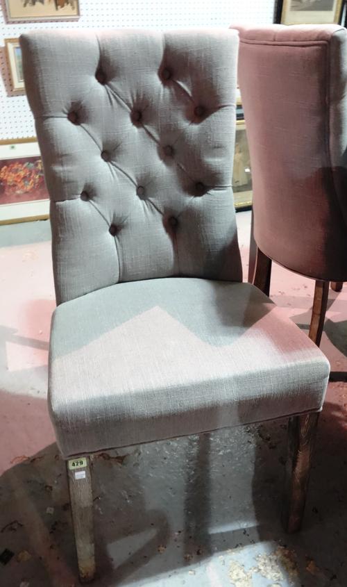 A set of four 20th century limed oak dining chairs with grey button back upholstery, (4).  BAY2