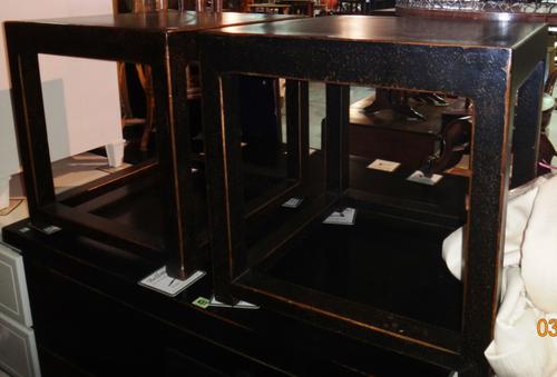 A pair of 20th century ebonised square coffee tables with inset marble top, 58cm wide x 49cm high (2).  K8