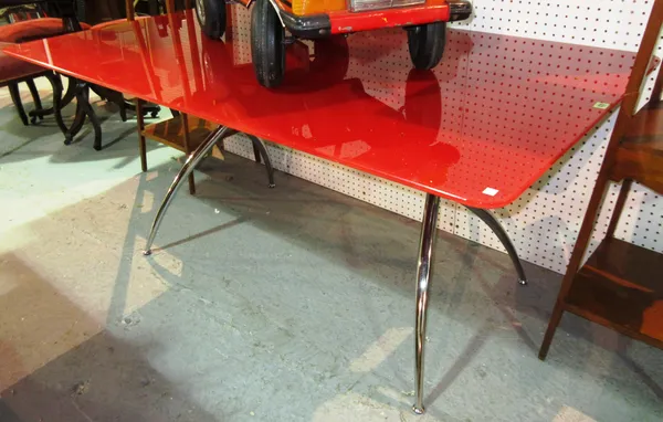 A 20th century red pearlescent glass top rectangular coffee table on chrome base, 90cm wide x 74cm high.   B5