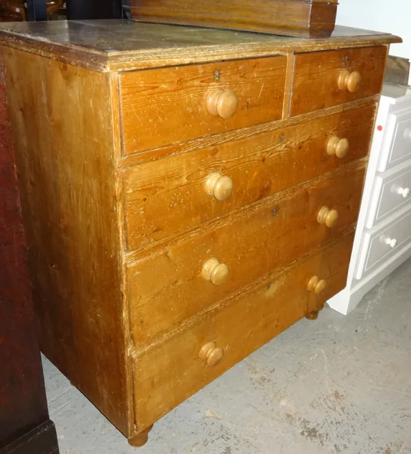 A late Victorian pine chest of two short and three long drawers on tapering supports, 105cm wide x 105cm high.  L7