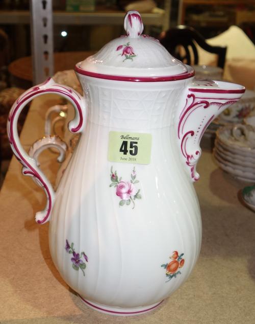 A group of Dresden ceramics, including; a part tea service, a hot water jug and a pierced basket, (qty).    S2M