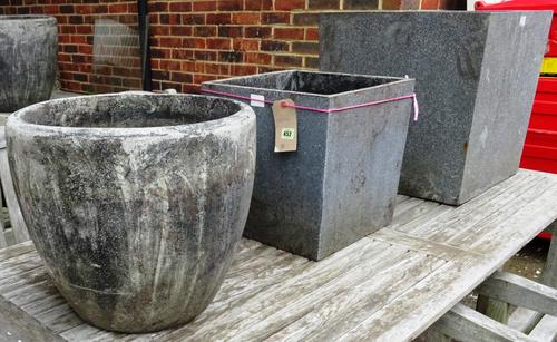 Garden statuary, comprising;  pair of 20th century reconstituted stone oval tapering plant pots, a smaller circular pot, a square tapering resin plant