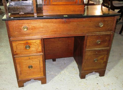 A late 19th century hardwood Naval officer's desk, with ebonised edges on bracket feet, 105cm wide x 78cm high. H6