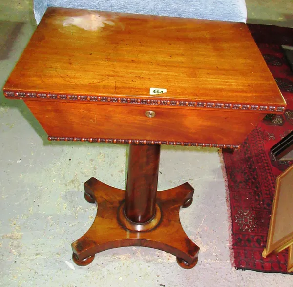 An early Victorian mahogany work table, of sarcophagus form, on tapering column and bun feet, 53cm wide x 72cm high.  D4