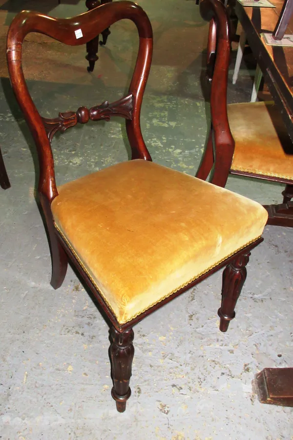 A set of four William IV mahogany spoon back dining chairs, on tulip shaped supports, (4).  I6