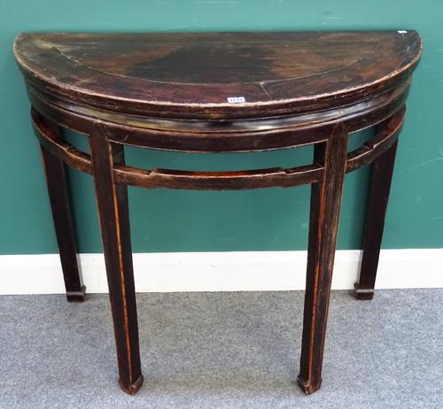 A 19th century Chinese hardwood demi-lune table, with open frieze on block supports, 101cm wide x 85cm high x 48cm deep.   J8