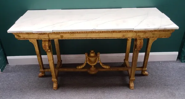 A gilt centre table in the 18th century Continental style, the shaped rectangular faux marble top on a gilt base, with urn mounted stretcher, 157cm wi