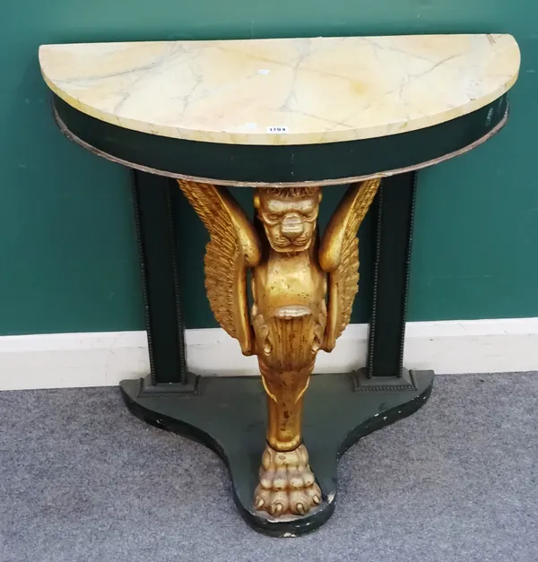 A 20th century console table, the semi-elliptic faux marble top on a gilded winged monopodia support, 87cm wide x 84cm high x 42cm deep.  H5