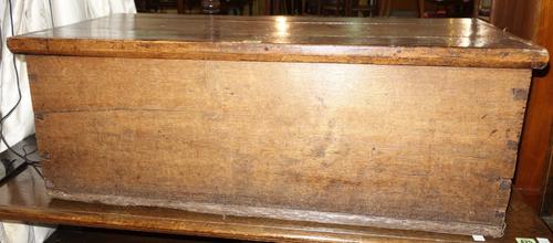 A 19th century oak rectangular lift top trunk, 93cm wide x 34cm high.  H6