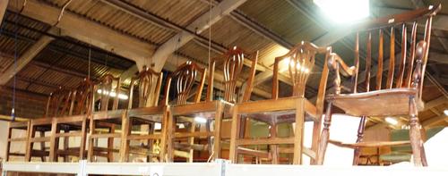 A matched set of eight 19th century oak shield back dining chairs and a 19th century ash and elm stick back open armchair, (9).  ST2T