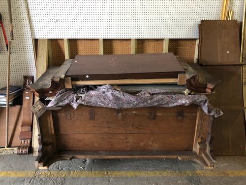 An early 19th century Dutch mahogany and parcel gilt armoire, dismantled (a.f).   OUT