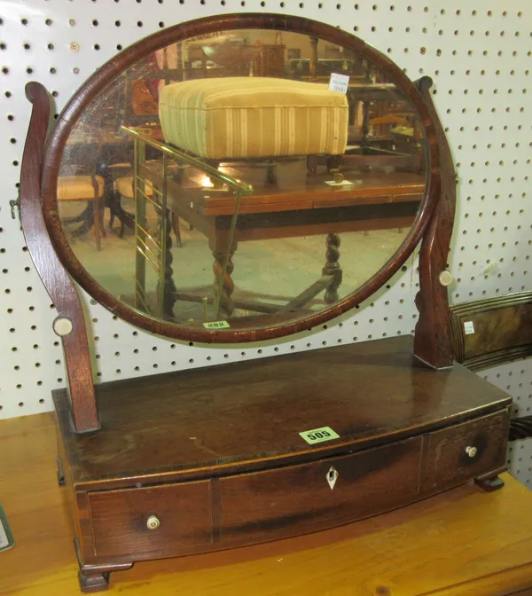 A George III mahogany oval swing frame toilet mirror, 44cm wide x 47cm high  F9