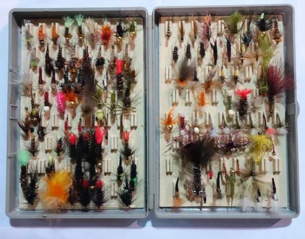 Fishing interest; fly tying vices and two tools, materials in packets, three fly boxes with flies, (qty).    CAB