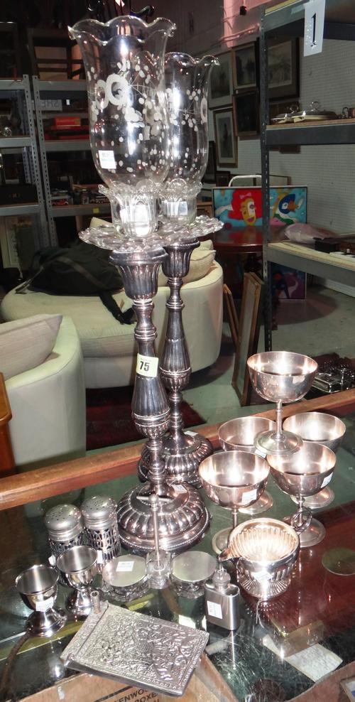 White metal wares, including;  a pair of candlesticks later converted for electricity, with glass shades, two egg cups, five wine goblets and sundry,