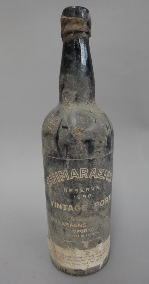 One bottle of Guimaraens 1958 vintage port, and another of similar age, possibly Guimaraens, (2).