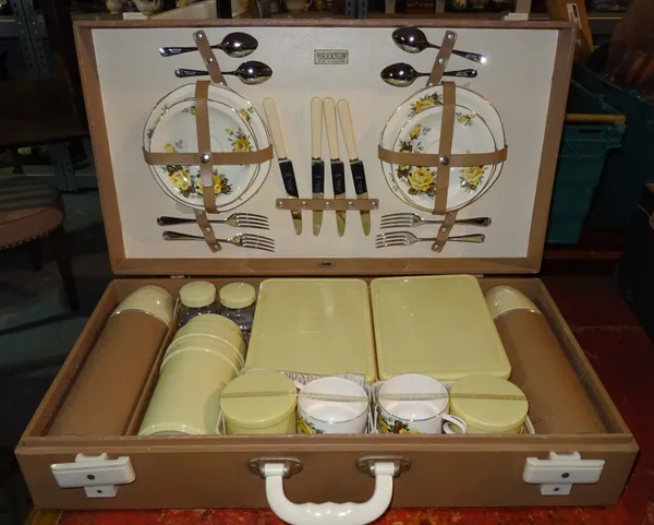 A brown cased Brexton picnic set for six.  K3