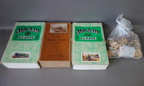 Five GWR vintage wooden jigsaw puzzles of railway interest, comprising; 'King George V', 'Locomotives Old and New', 'The Cheltenham Flyer', 'Royal Rou