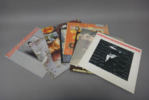 Vinyl records; a group of iconic vinyl albums, comprising Elvis Costello 'My Aim is True' SEE2 3-A, Led Zeppelin 'III Atlantic' 2401 002, David Bowie