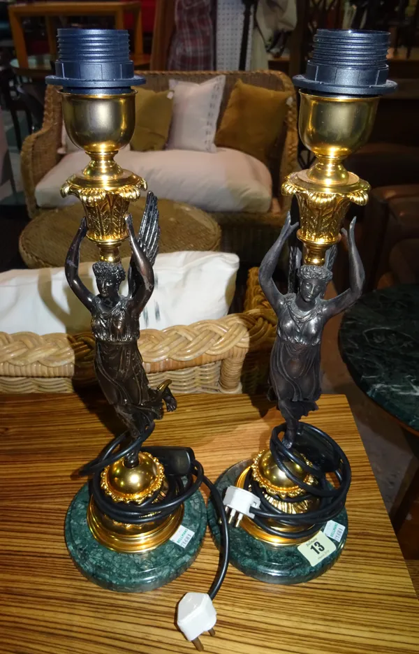 A pair of 20th century bronze lamps, each with figural angel column, on a circular marble plinth base, 43cm high, (2).