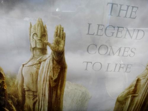 A film poster 'Lord of the Rings: The Fellowship of the Ring', New Line Cinema, 2001, 100 x 69cms., framed, together with War of the Ring, Middle Eart